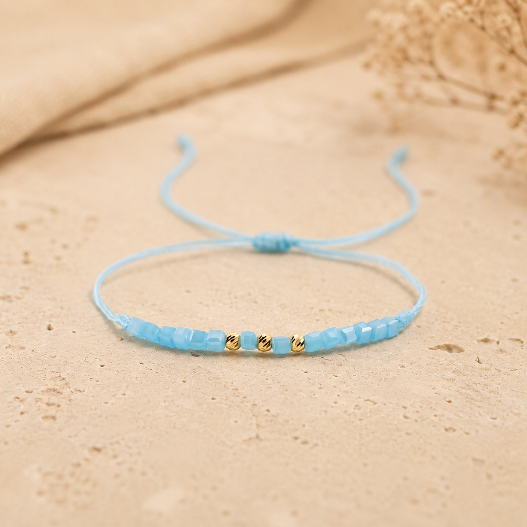 PULSERA DE HILO TEJIDA CON 3 BALINES DIAMANTADOS - 03