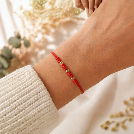 PULSERA DE HILO TEJIDA CON 3 BALINES DIAMANTADOS - 04